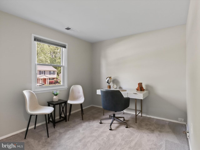 office with visible vents, carpet, and baseboards