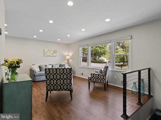 interior space featuring recessed lighting, baseboards, wood finished floors, and visible vents