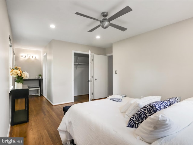bedroom featuring ceiling fan, dark wood finished floors, baseboards, a closet, and recessed lighting