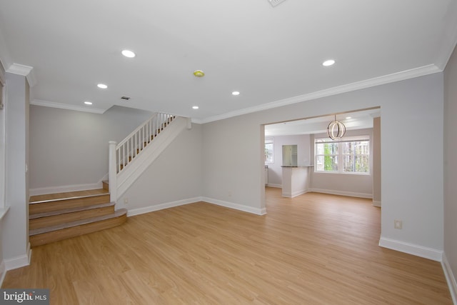 unfurnished living room featuring stairway, ornamental molding, and light wood-style flooring