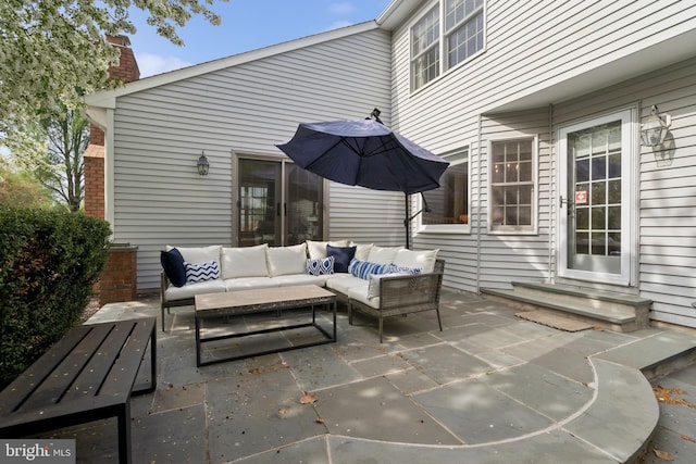 view of patio featuring entry steps and an outdoor hangout area