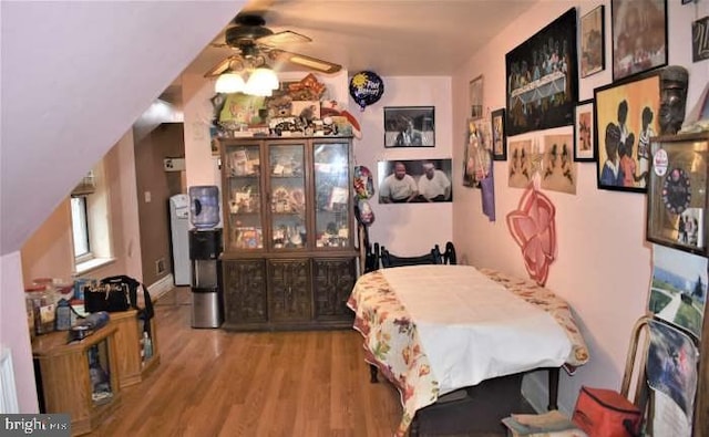 bedroom with wood finished floors
