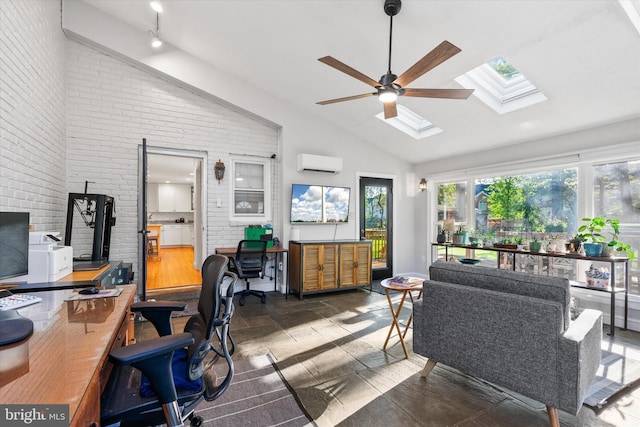 office space featuring a skylight, stone tile flooring, a wall mounted air conditioner, high vaulted ceiling, and a ceiling fan
