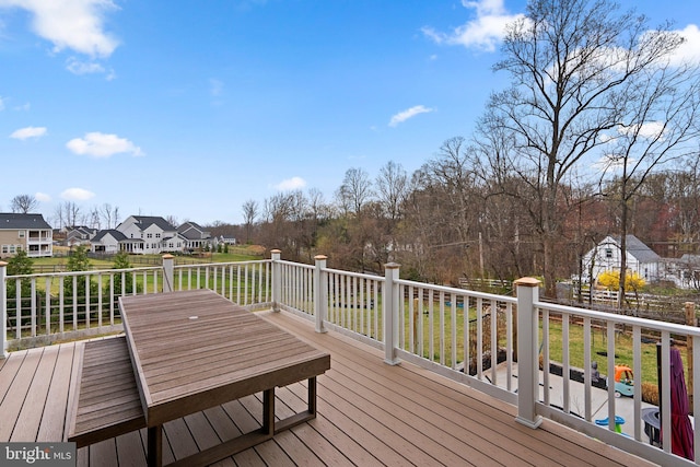wooden deck with a residential view