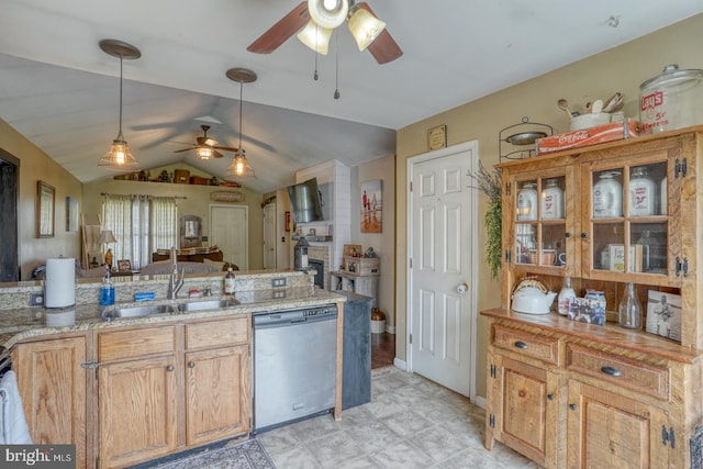 415 W High St, Felton, DE 19943 - kitchen with stainless steel dishwasher, a sink, ceiling fan, open floor plan, and vaulted ceiling