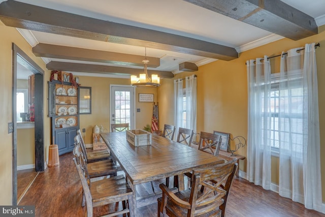 415 W High St, Felton, DE 19943 - dining space featuring dark wood-style flooring, a notable chandelier, and baseboards