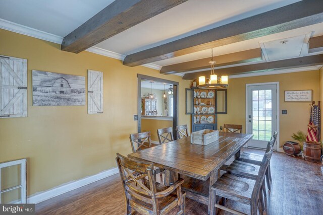 415 W High St, Felton, DE 19943 - dining area featuring wood finished floors, beamed ceiling, baseboards, a notable chandelier, and crown molding
