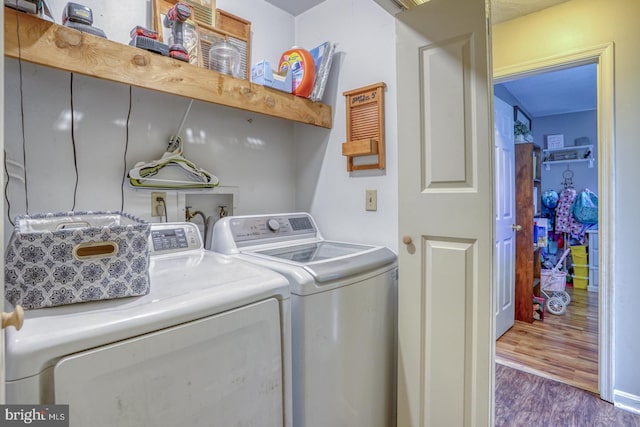 415 W High St, Felton, DE 19943 - laundry room with washer and clothes dryer, dark wood-style floors, and laundry area