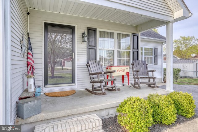 415 W High St, Felton, DE 19943 - doorway to property with covered porch