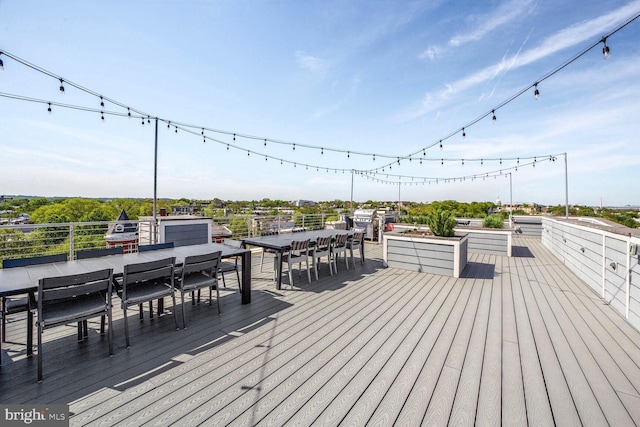 deck featuring outdoor dining space