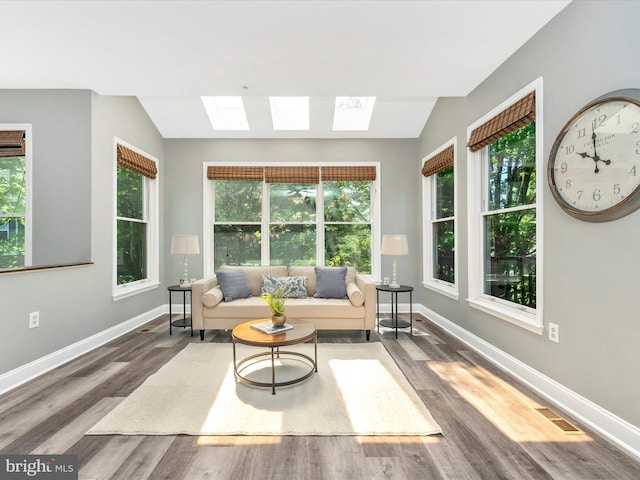109 Rock Creek Ct, Frederick, MD 21702 - living room featuring baseboards, visible vents, a skylight, and wood finished floors