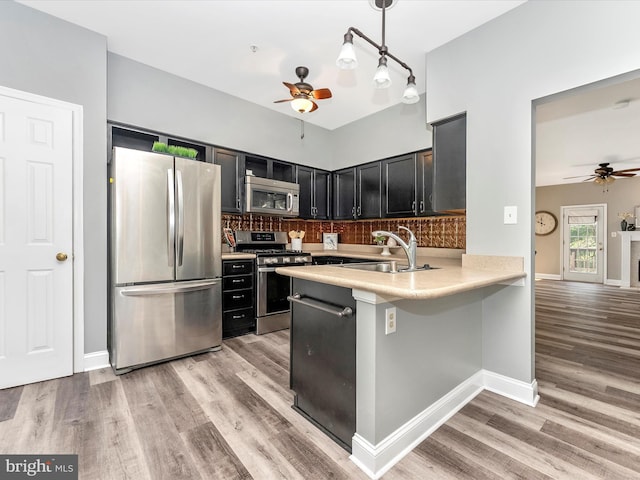 109 Rock Creek Ct, Frederick, MD 21702 - kitchen with a ceiling fan, a sink, stainless steel appliances, and light countertops