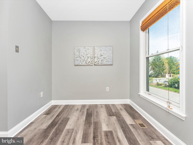 109 Rock Creek Ct, Frederick, MD 21702 - spare room featuring wood finished floors, visible vents, and baseboards