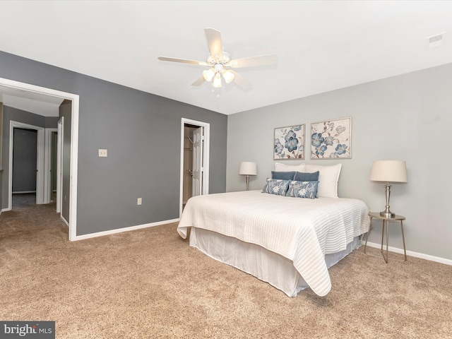 109 Rock Creek Ct, Frederick, MD 21702 - carpeted bedroom featuring visible vents, ceiling fan, a walk in closet, and baseboards
