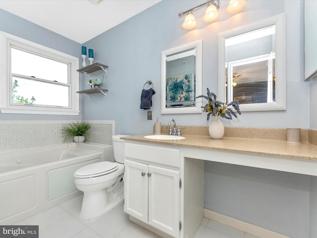 109 Rock Creek Ct, Frederick, MD 21702 - full bathroom featuring tile patterned floors, toilet, a garden tub, and vanity