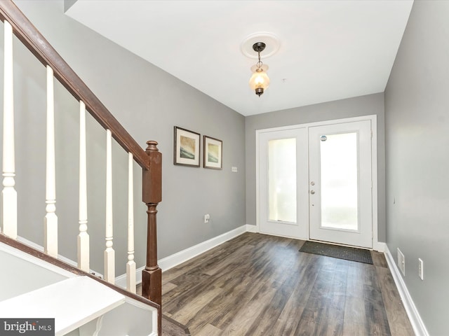 109 Rock Creek Ct, Frederick, MD 21702 - foyer with stairway, wood finished floors, french doors, and baseboards