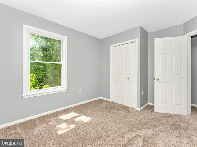 109 Rock Creek Ct, Frederick, MD 21702 - unfurnished bedroom featuring a closet, carpet floors, and baseboards