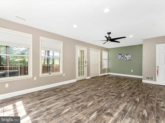 109 Rock Creek Ct, Frederick, MD 21702 - unfurnished living room with dark wood-style floors, visible vents, a ceiling fan, and baseboards