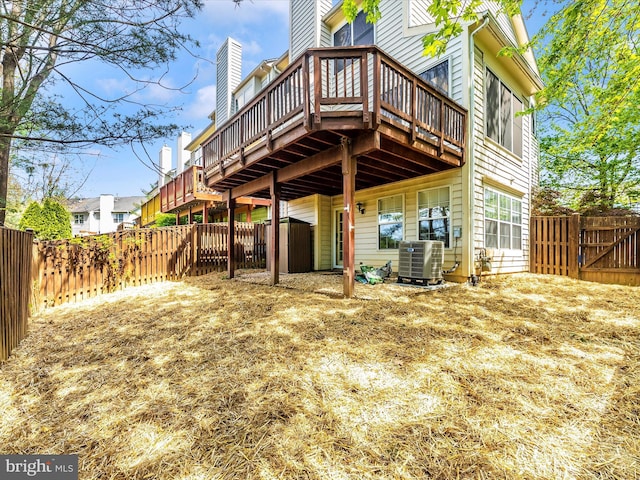 109 Rock Creek Ct, Frederick, MD 21702 - rear view of property with cooling unit, a wooden deck, and a fenced backyard