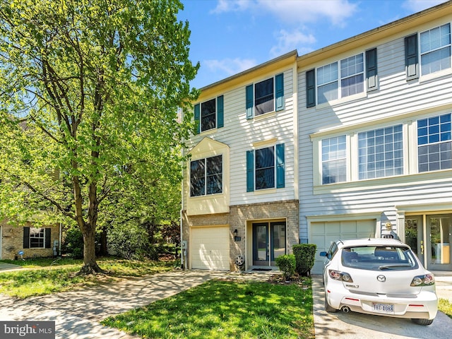 109 Rock Creek Ct, Frederick, MD 21702 - townhome / multi-family property featuring driveway and an attached garage