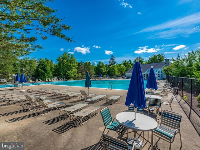 109 Rock Creek Ct, Frederick, MD 21702 - community pool with fence and a patio area