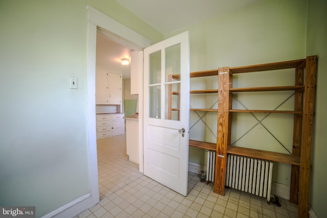 spare room with radiator heating unit