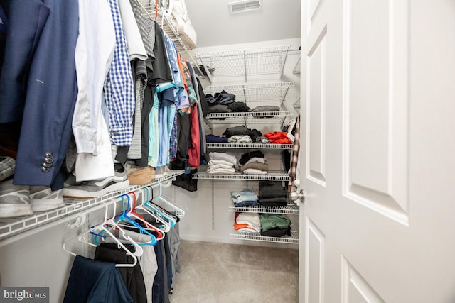 spacious closet featuring carpet floors and visible vents