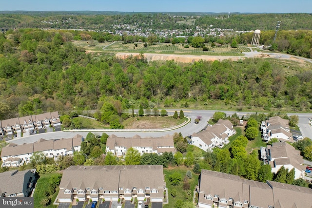 bird's eye view with a residential view and a view of trees