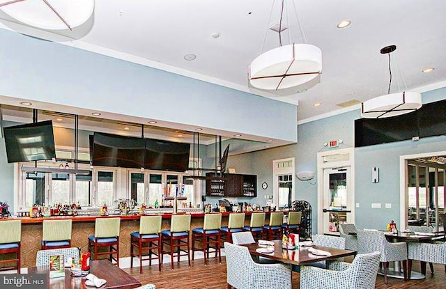 dining area featuring recessed lighting and wood finished floors