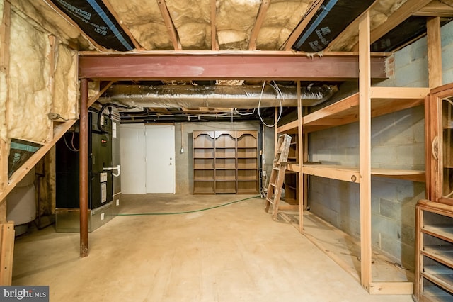 unfinished basement with heating unit