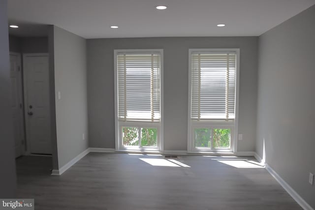 1029 Kings Ct, Herndon, VA 20170 - empty room featuring baseboards, a wealth of natural light, and wood finished floors