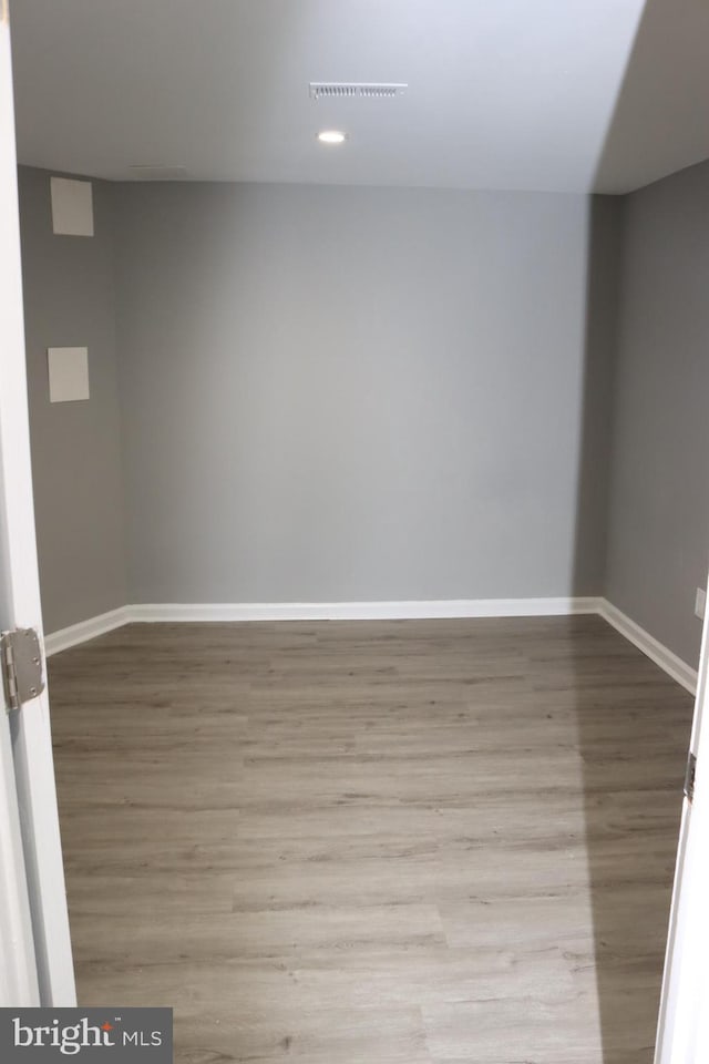 1029 Kings Ct, Herndon, VA 20170 - unfurnished room featuring visible vents, wood finished floors, baseboards, and recessed lighting