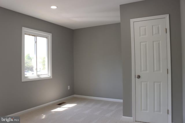 1029 Kings Ct, Herndon, VA 20170 - spare room featuring light carpet, baseboards, visible vents, and recessed lighting