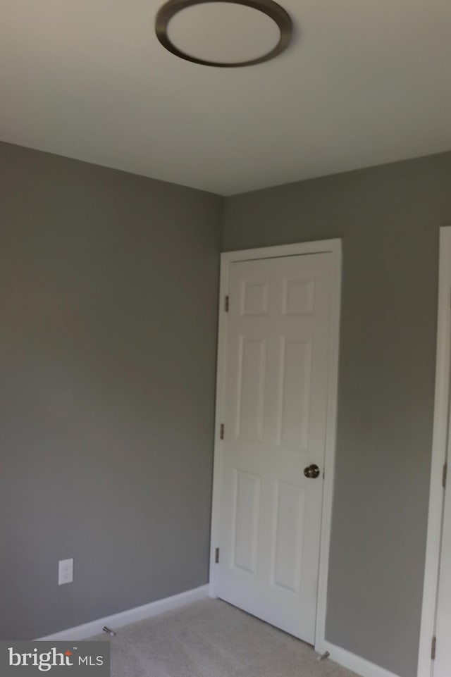 1029 Kings Ct, Herndon, VA 20170 - unfurnished room with light colored carpet and baseboards