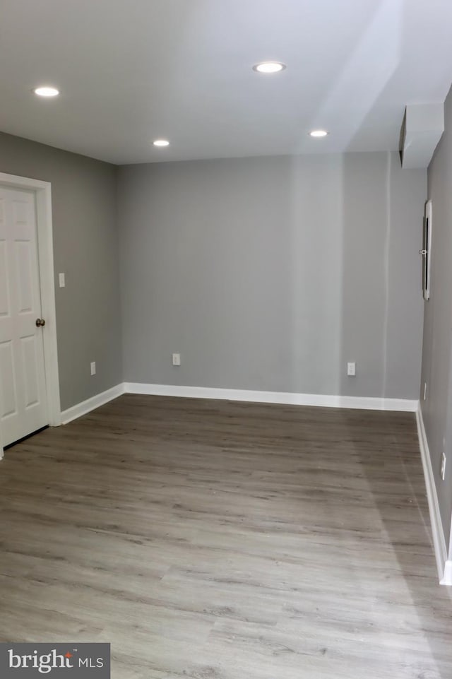 1029 Kings Ct, Herndon, VA 20170 - basement with wood finished floors, baseboards, and recessed lighting