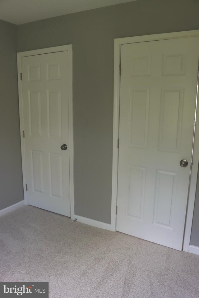 1029 Kings Ct, Herndon, VA 20170 - unfurnished bedroom featuring carpet flooring and baseboards