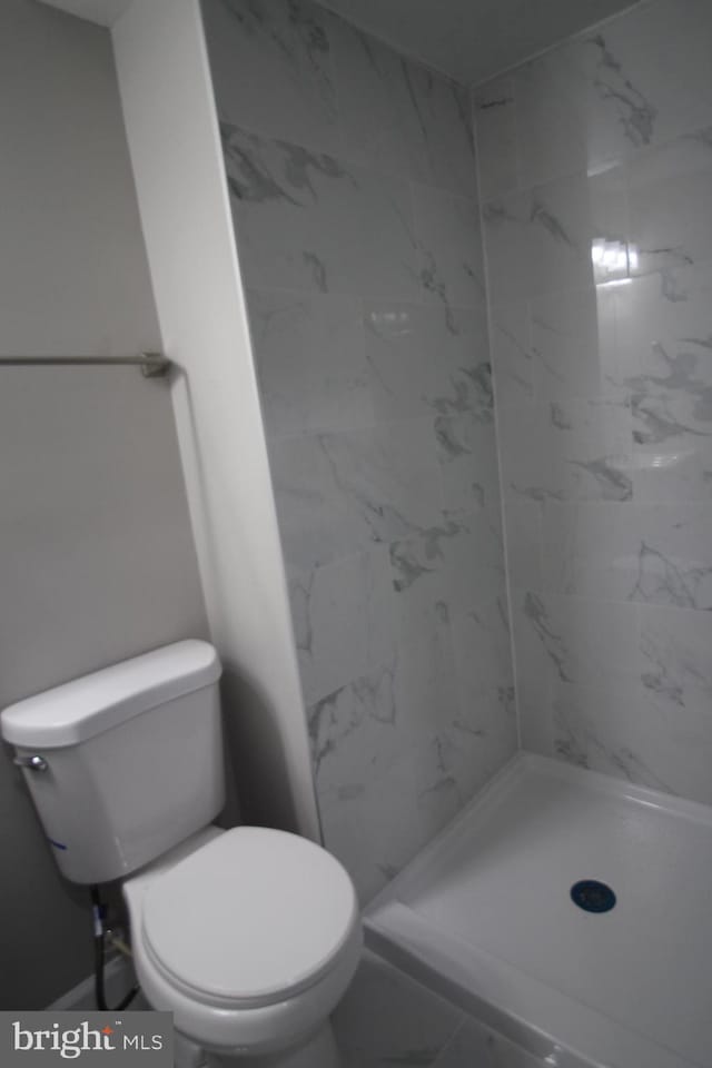 1029 Kings Ct, Herndon, VA 20170 - bathroom featuring toilet, a shower stall, and marble finish flooring
