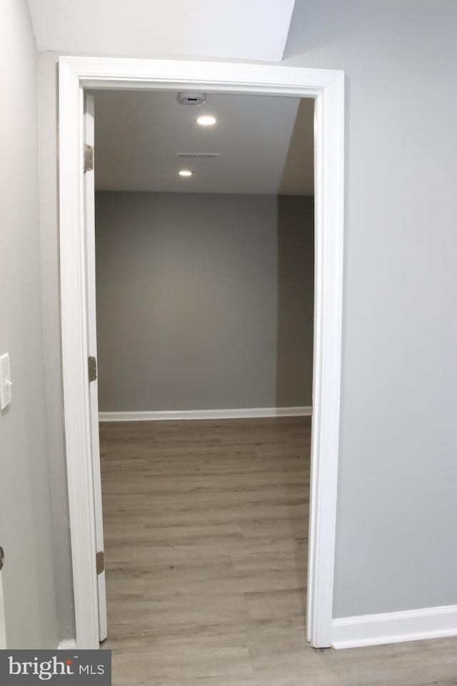1029 Kings Ct, Herndon, VA 20170 - hall with baseboards, visible vents, and wood finished floors