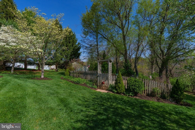 view of yard with fence