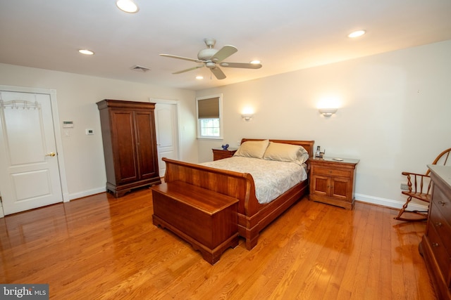 bedroom with recessed lighting, baseboards, light wood finished floors, and visible vents