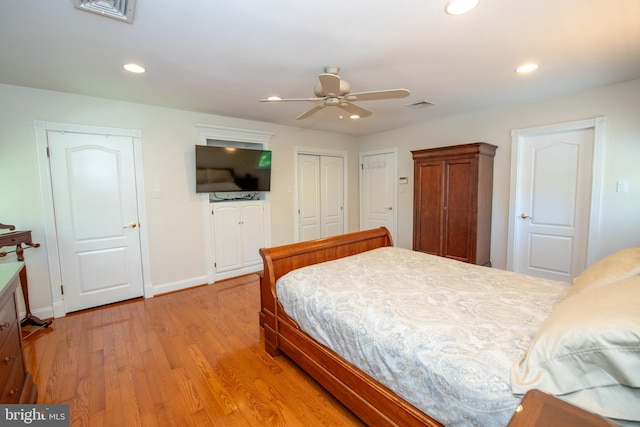 bedroom featuring recessed lighting, baseboards, light wood-type flooring, and visible vents
