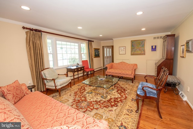living area with crown molding, baseboards, recessed lighting, and wood finished floors