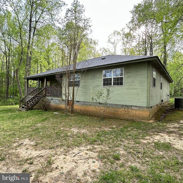 exterior space with crawl space, a porch, and cooling unit