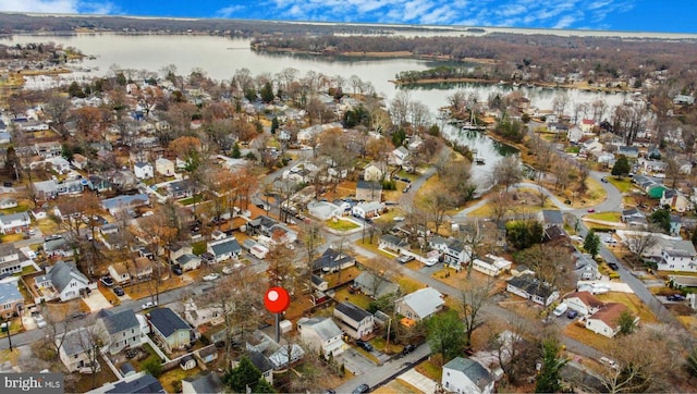 aerial view featuring a residential view and a water view