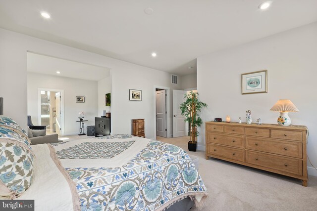 bedroom with light colored carpet, baseboards, visible vents, and recessed lighting