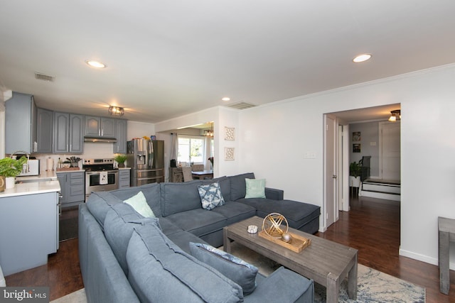 living area with visible vents, recessed lighting, and dark wood-style flooring