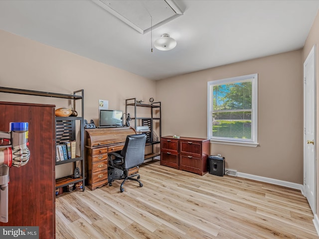 3322 Johnsons Mill Rd, Berkeley Springs, WV 25411 - home office featuring attic access, wood finished floors, and baseboards