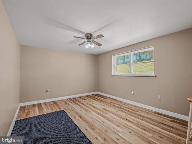3322 Johnsons Mill Rd, Berkeley Springs, WV 25411 - spare room with ceiling fan, baseboards, and wood finished floors