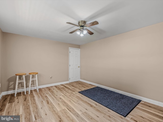 3322 Johnsons Mill Rd, Berkeley Springs, WV 25411 - empty room featuring baseboards, wood finished floors, and ceiling fan