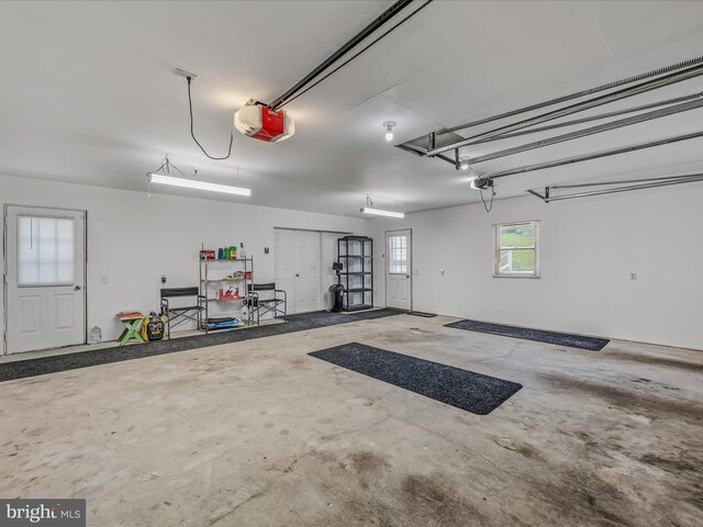 3322 Johnsons Mill Rd, Berkeley Springs, WV 25411 - garage featuring a garage door opener